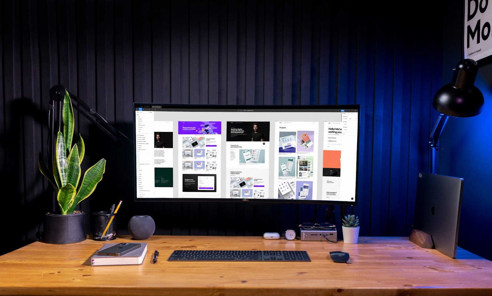 Designer using Canva Magic Studio AI tools at a creative desk