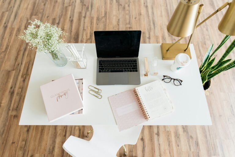 Figma nested folders workspace organization on a designer's desk