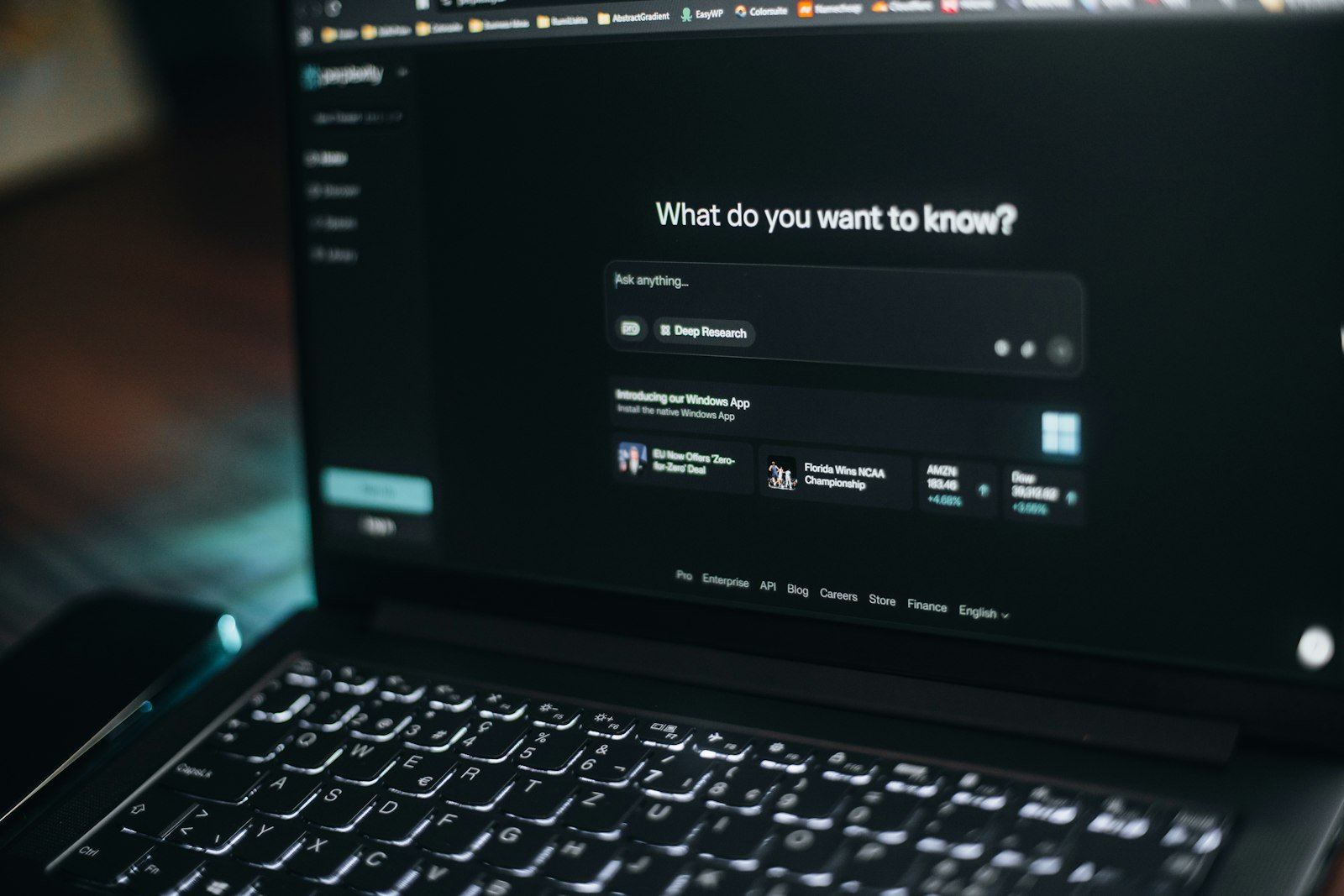 An AI search engine dashboard open on a laptop screen, representing generative engine optimization for WordPress