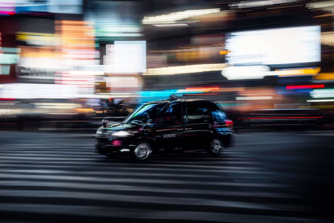 Tesla Cybercab Investigation into a driverless taxi driving through a city at night