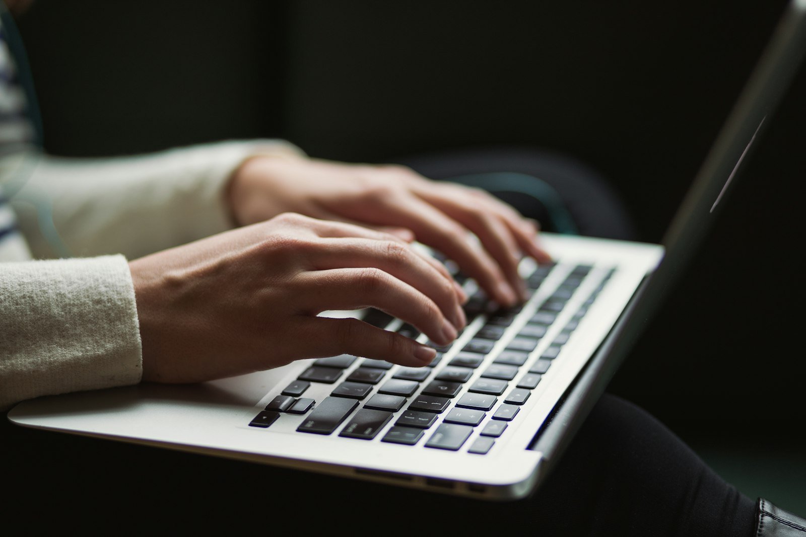 Person chatting with GPT-6 Astra on a laptop