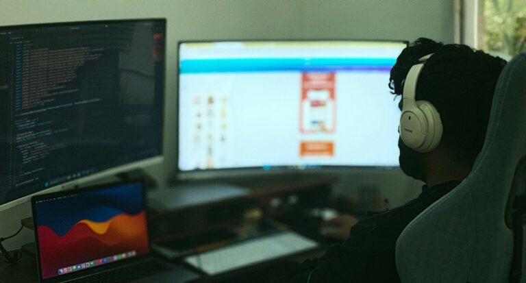 RTX Spark Photoshop acceleration shown on a designer's multi-monitor workstation