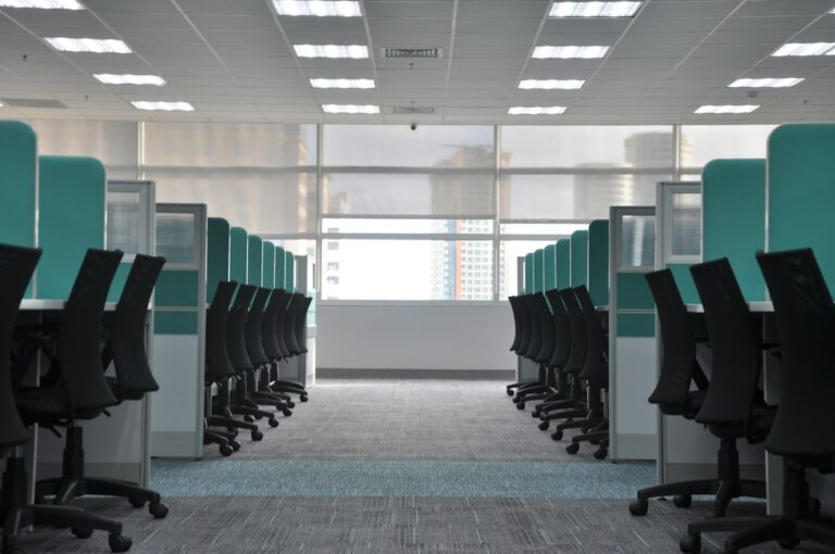 Tech layoffs 2026 shown by an empty corporate office floor