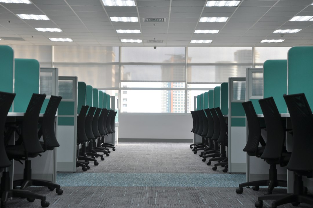 Tech layoffs 2026 shown by an empty corporate office floor